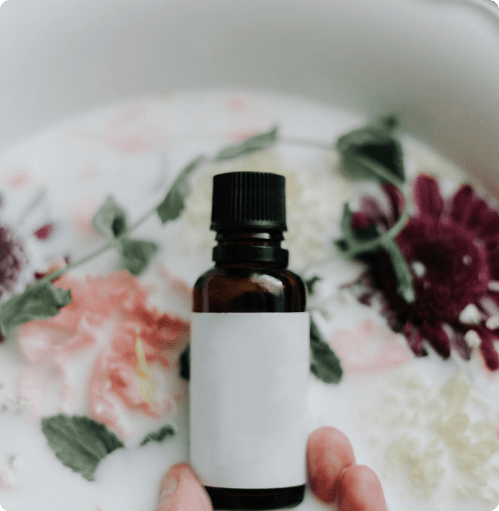 Essential oil bottle with flowers